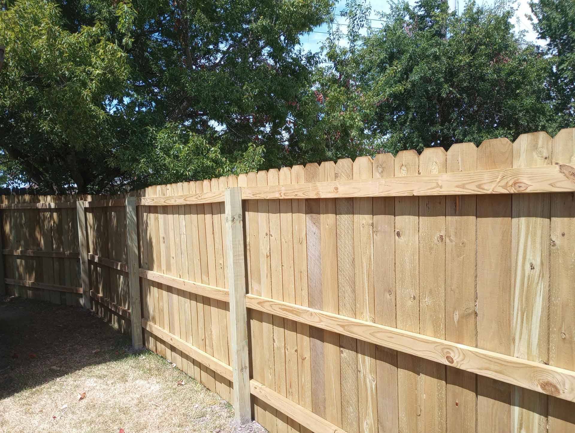 A wooden privacy fence